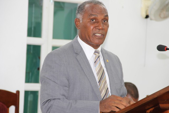 Hon. Vance Amory, Premier of Nevis and Minister of Finance presenting resolutions at a sitting of the Nevis Island Assembly on July 12, 2016